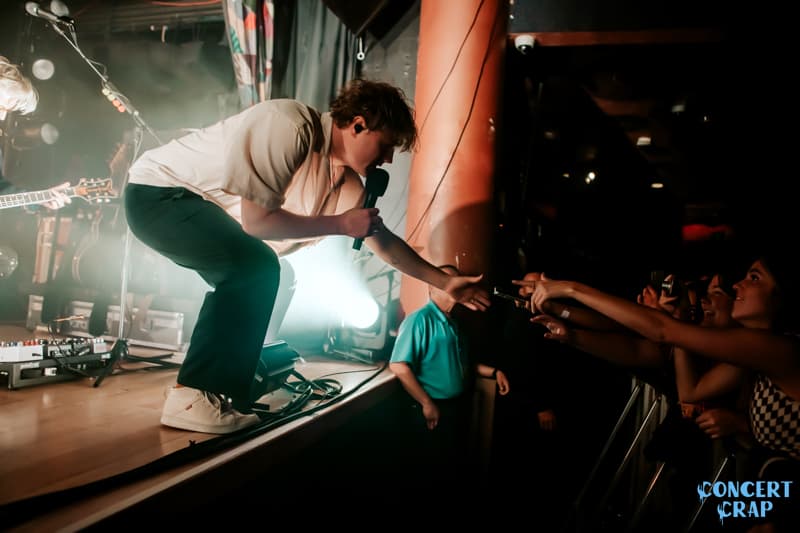 Caleb Chapman gives a fan a hand at Colony House at House of Blues San Diego on their 4th headlining tour "The Cannonballers Tour". 